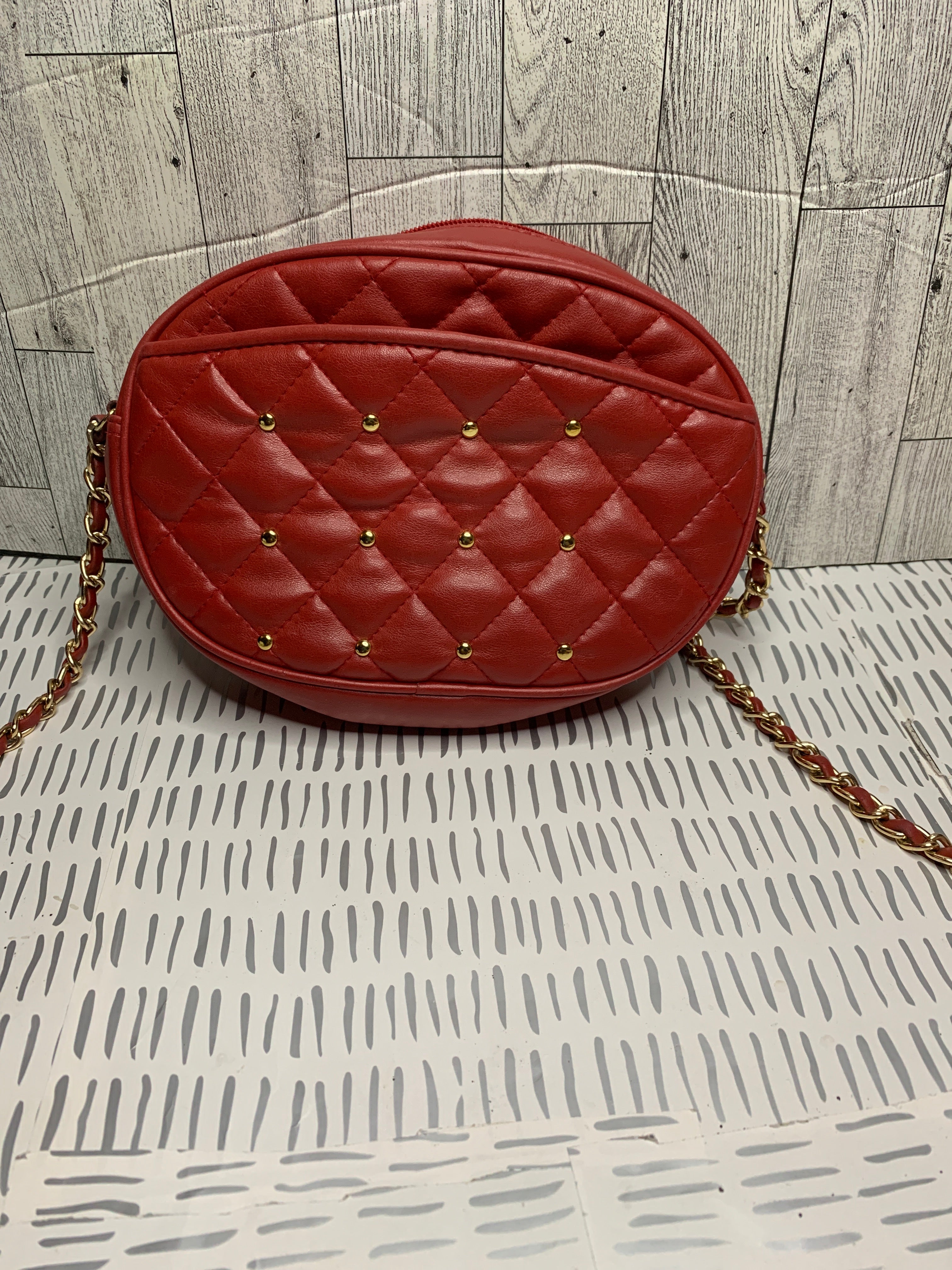 Studded quilted crossbody bag