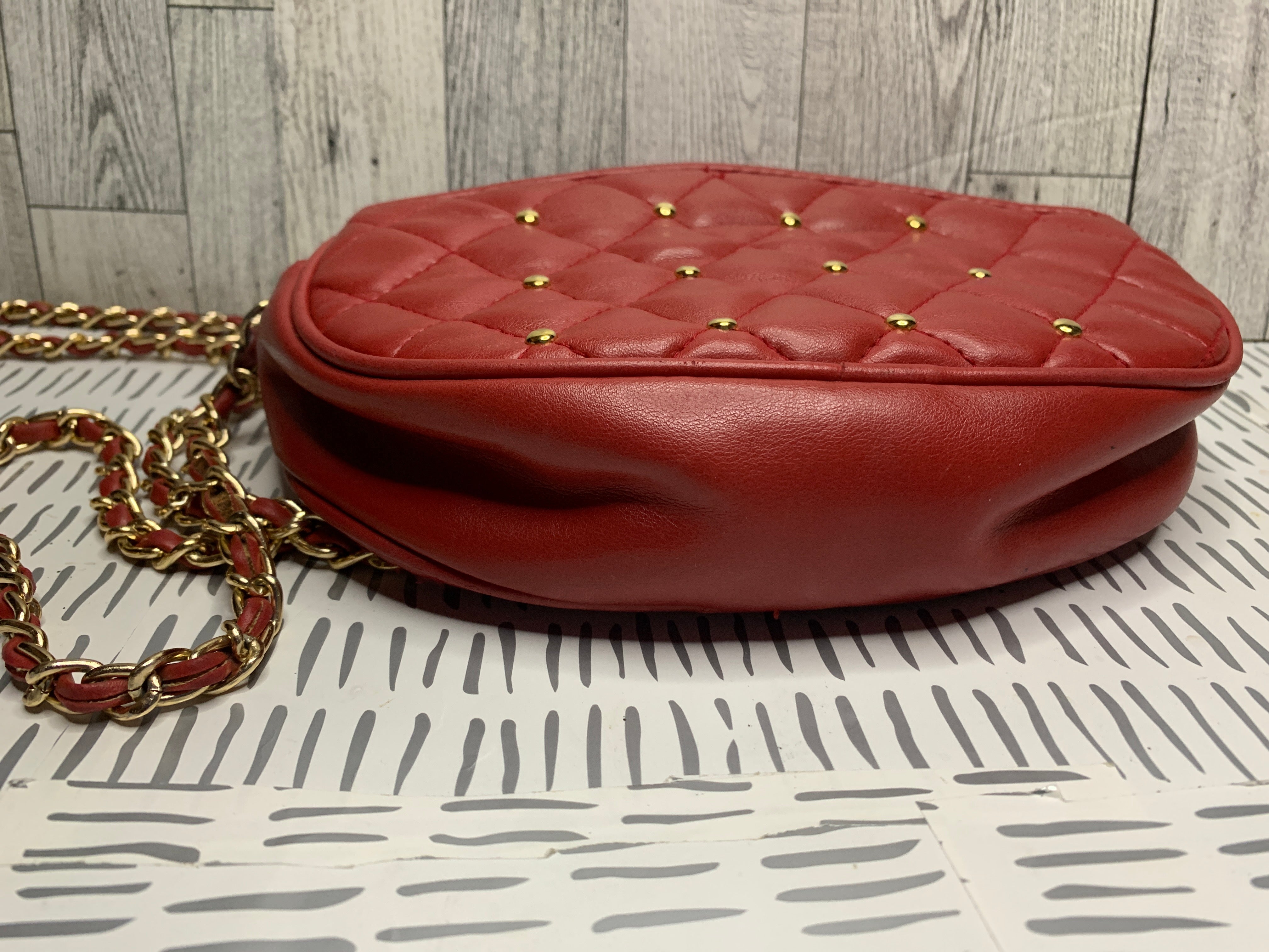 Studded quilted crossbody bag