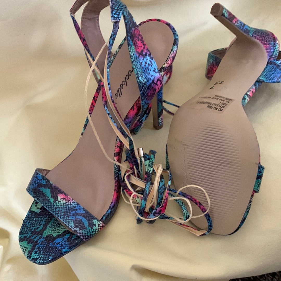 Snakeskin print heels