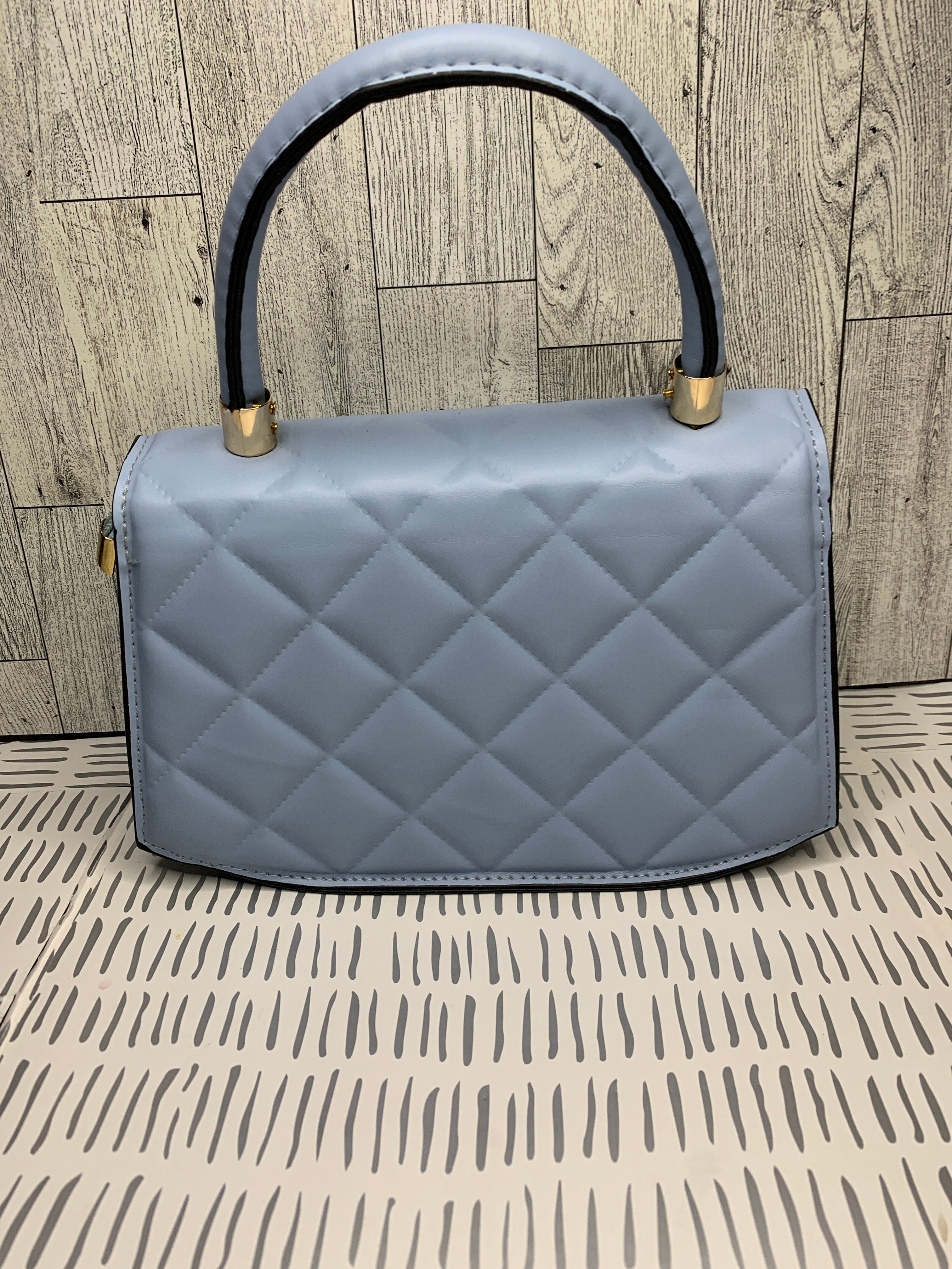 Baby blue top handle bag